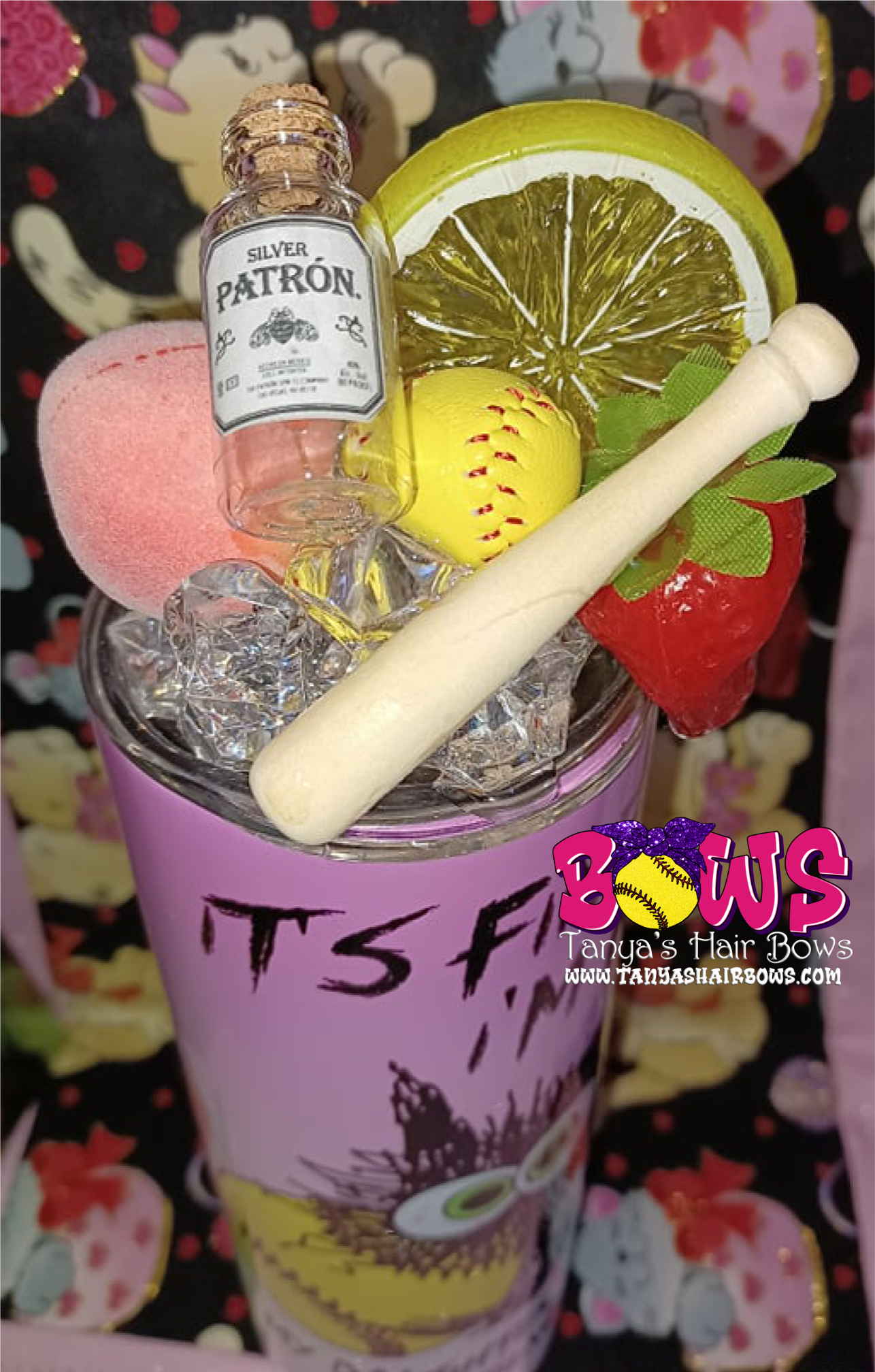 Softball Topper with faux fruit an bottle of Patron